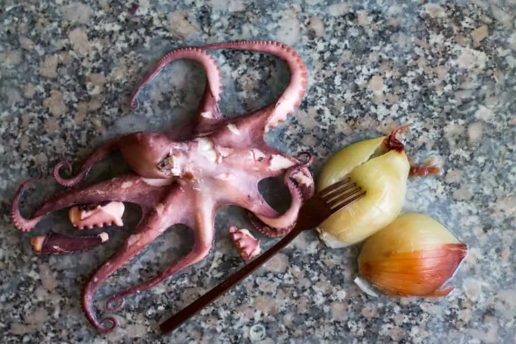 Octopus Salad with Lemon Pepper Dressing Step 4 remove the octopus from the pot2