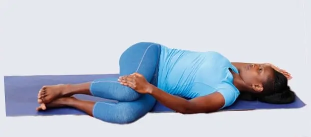11. Two knees supine twist