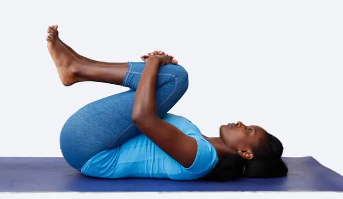 7. Knees To Chest Pose