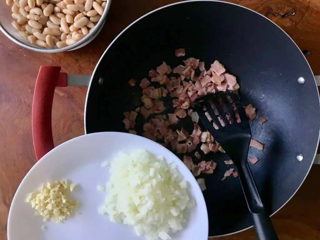 3.baked beans saute the onion and garlic