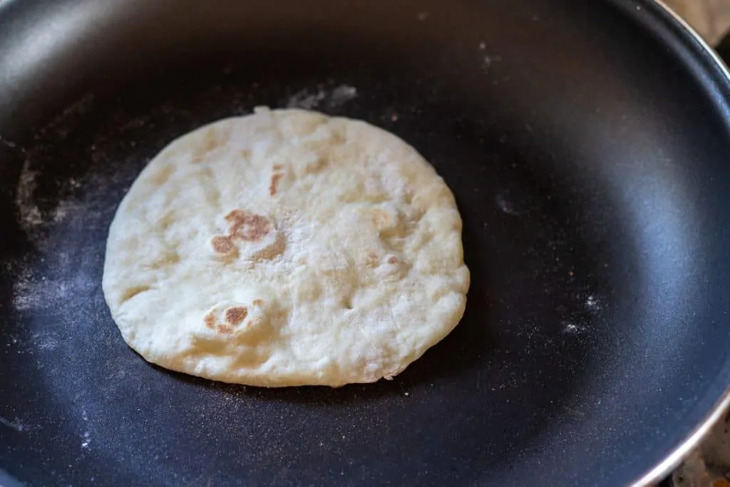 Salmon Tacos With Red Cabbage and Green Apple Slaw step 6 Flip tortilla