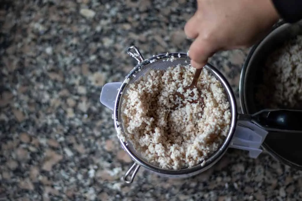 Horchata with Mint and Cocoa Step 5 press the liquid out