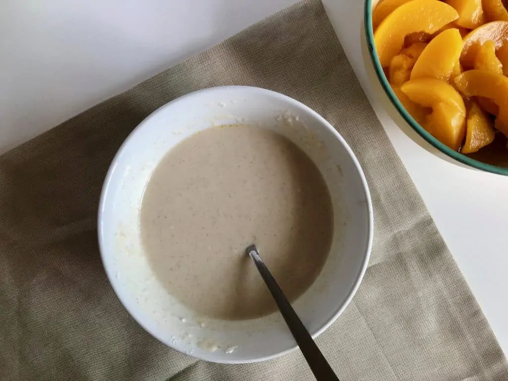 3. peach cobbler pour in the milk