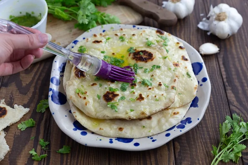Brushing naan