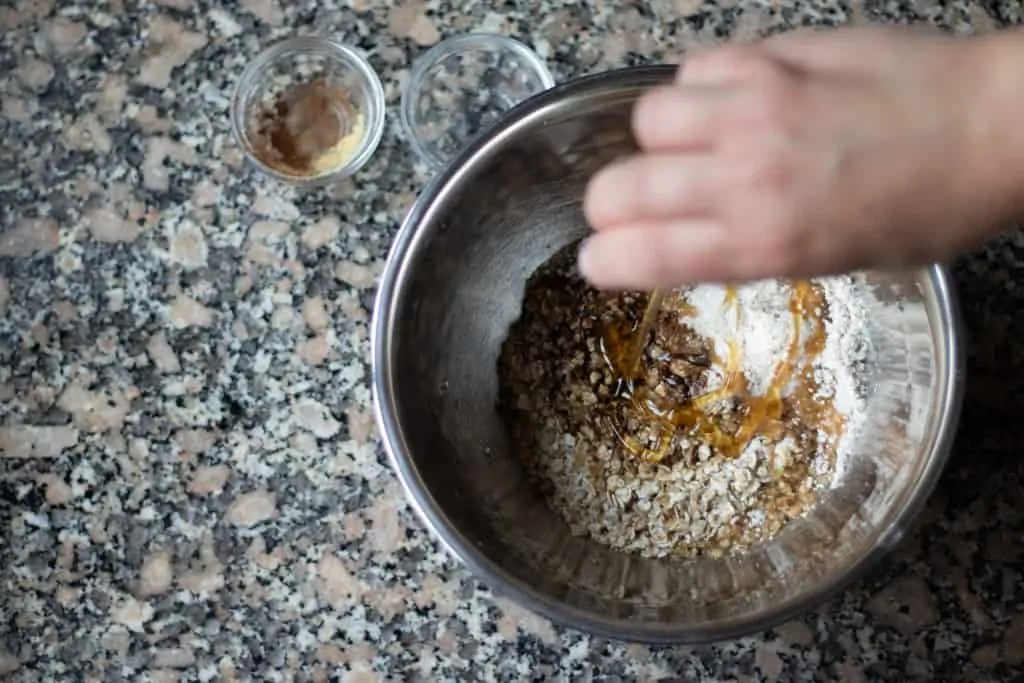 Apple Pie with Oatmeal Crust and Almond Granola Topping Step 1 add the honey 1