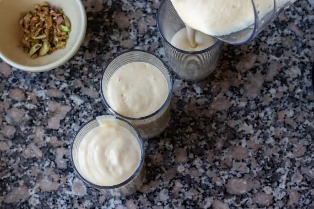 Coconut Milk Mango Lassi with Cardamon and Pistachios Step 7 Pour into glasses