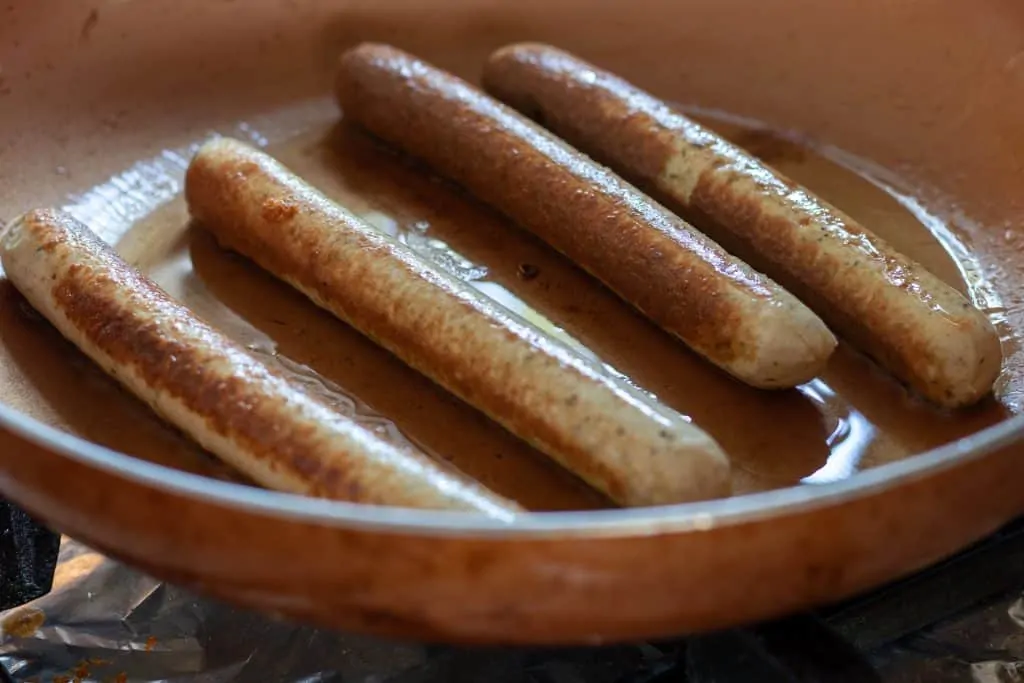 Slow Cooker Lentil Chili Coney Island Vegetarian Hot Dogs Step 5 cook the sausages