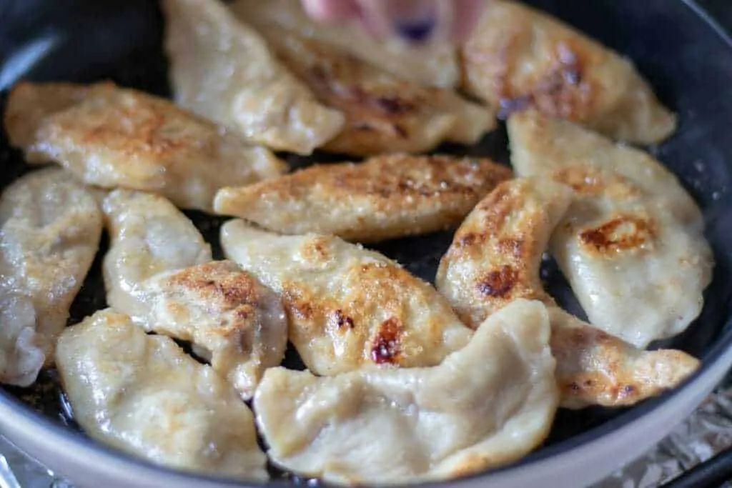 Blueberry and Nectarine Dessert Pierogi Step 11 brown the pierogi