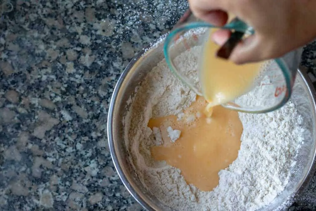 Blueberry and Nectarine Dessert Pierogi Step 2 add egg to flour