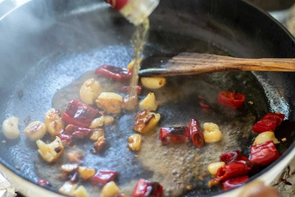 Portuguese Piri Piri Pepper Whiskey Sauce Step 4 ADD WHISKEY TO GARLIC AND CHILIES