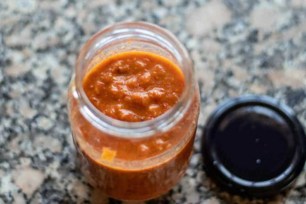 Portuguese Piri Piri Pepper Whiskey Sauce Step 7 TRANSFER SAUCE TO CONTAINER