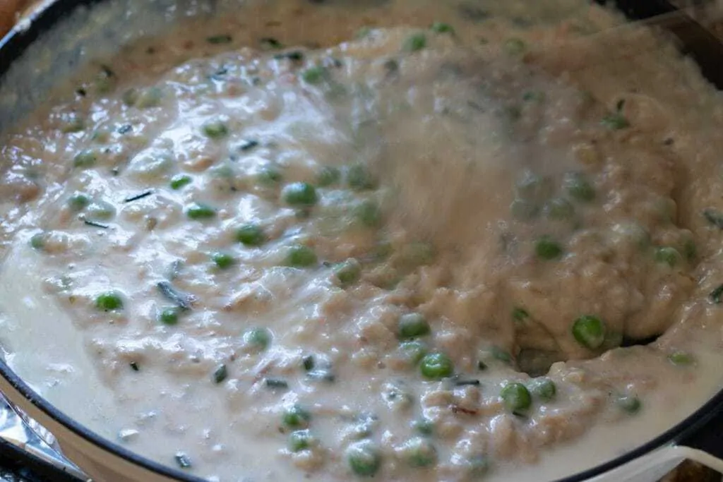 Tuna Scalloped Potato Casserole Step 6 add peas to sauce
